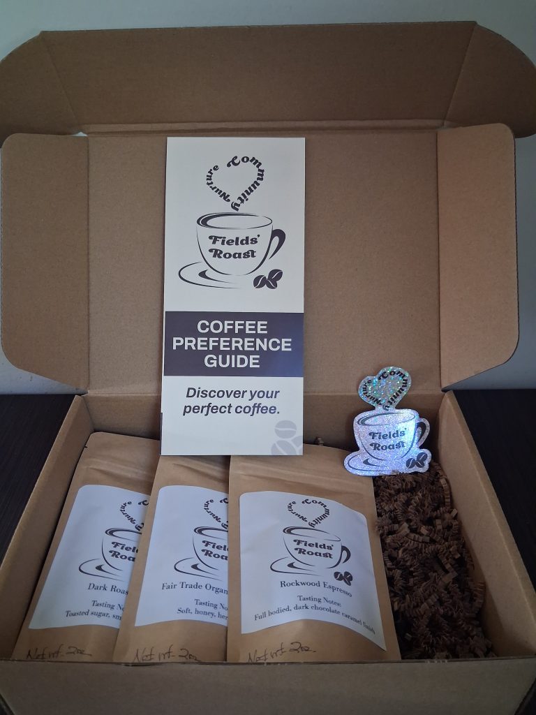 example coffee discovery kit, includes three two oz coffee samples with a pamphlet and sticker